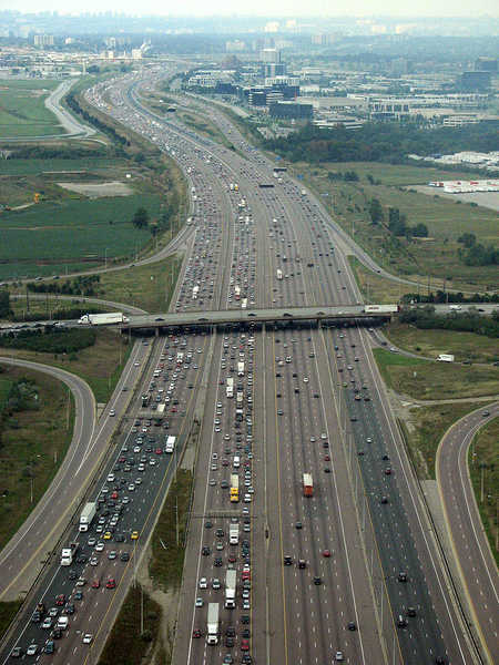 A view of the 18-lane wide Highway 401 south of Toronto Pearson International Airport in Mississauga, Ontario.