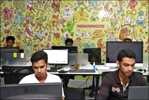 Design artists work on their computer terminals at the Start-up Village.