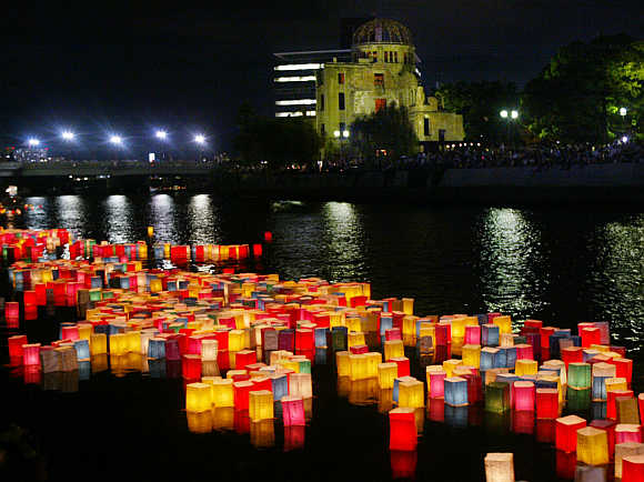 Paper lanterns symbolising vicitims of the 1945 atomic bombs float on a river in Hiroshima.
