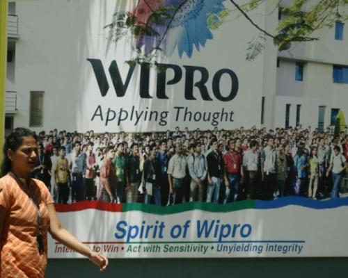 People walk in the Wipro campus in Bangalore