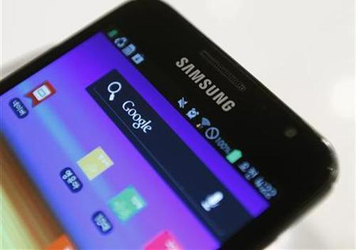 Samsung's logo is seen on a Galaxy smartphone displayed at the company's headquarters in Seoul.