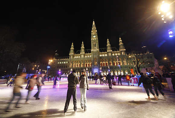 Skaters on an ice rink in Vienna.