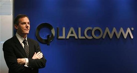 Qualcomm chief executive Paul Jacobs poses during his meeting with reporters in Hong Kong