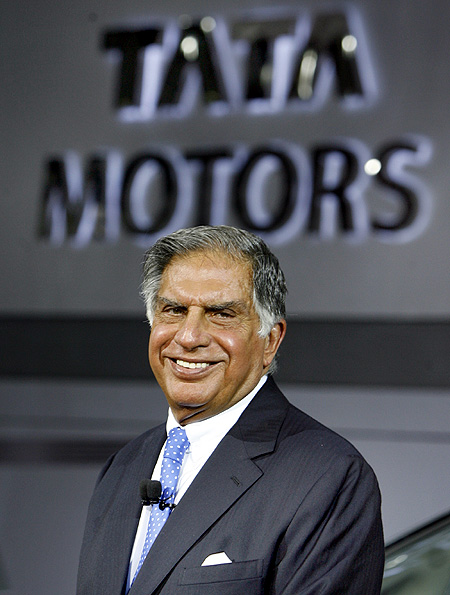 Ratan Tata smiles during the unveiling ceremony of Tata Motor's Aria at Auto Expo in New Delhi.