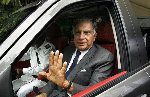 Ratan Tata leaves after addressing a news conference to announce the launch of Jaguar and Land Rover in India, in Mumbai.