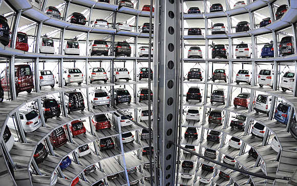Volkswagen cars in a delivery tower at the company's headquarters in Wolfsburg, Germany.