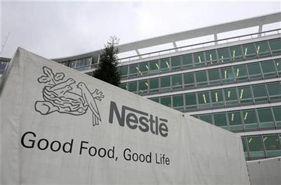 The exterior of a lorry's cargo compartment is pictured outside the headquarter of Nestle.
