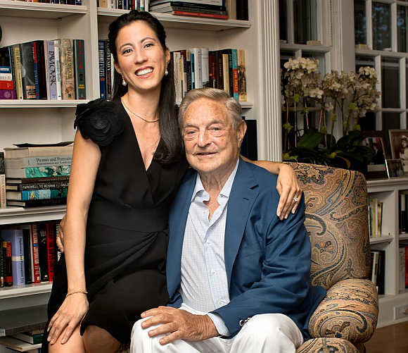 George Soros with his girlfriend Tamiko Bolton at Soros's residence in Southampton, New York.