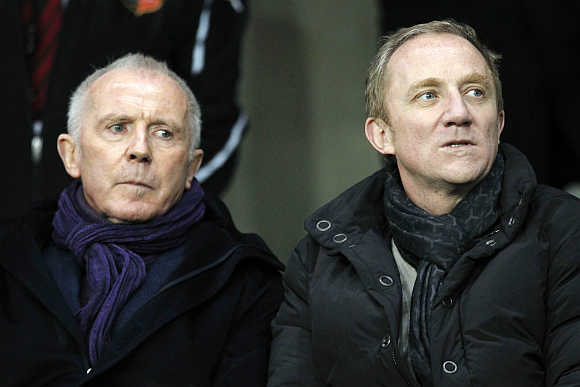 Francois, left, with his son Francois-Henri Pinault, right, in Rennes, France.