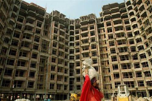 A labourer works at a construction site.