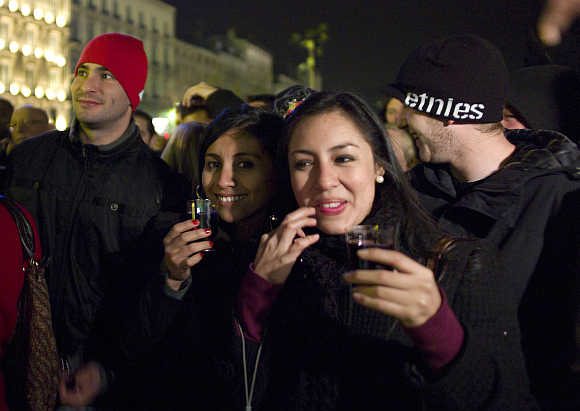 People attend the official launch of the 2011 Beaujolais Nouveau in the centre of Lyon, France.