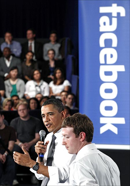 US President Barack Obama attends a town-hall meeting at Facebook headquarters with CEO Mark Zuckerberg in Palo Alto.