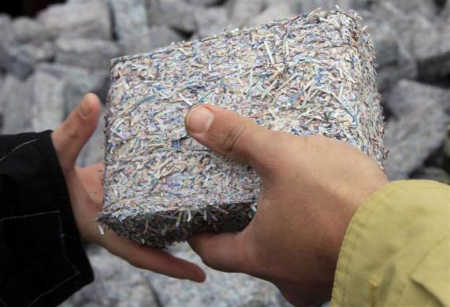 Banknotes shredded and compressed into heating fuel.