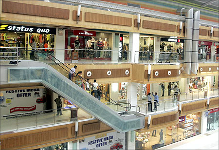 People shop inside Reliance Mart, a shopping mall in Ahmedabad.