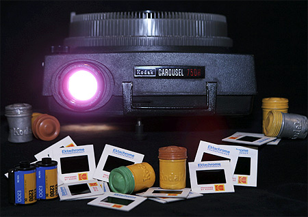 An Eastman Kodak Carousel slide projector, with 35mm color slide and film cannisters, are shown January 6, 2012 in this studio illustration in Washington.