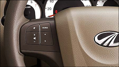 Audio control on steering wheel.