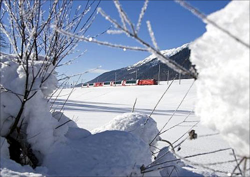 Glacier Express in the Goms valley at winter.