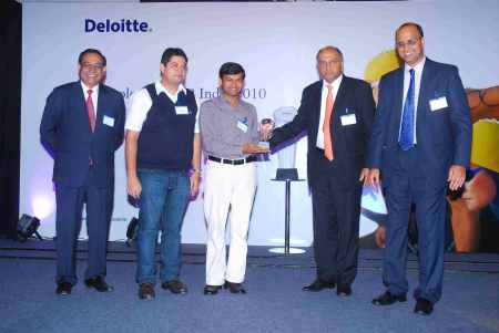 Phanindra Sama recieves am award for redBus from Deloitte