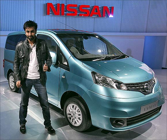 Bollywood actor Ranbir Kapoor gestures during the unveiling of Nissan Motor Co's new Evalia car at India's Auto Expo in New Delhi on Thursday.