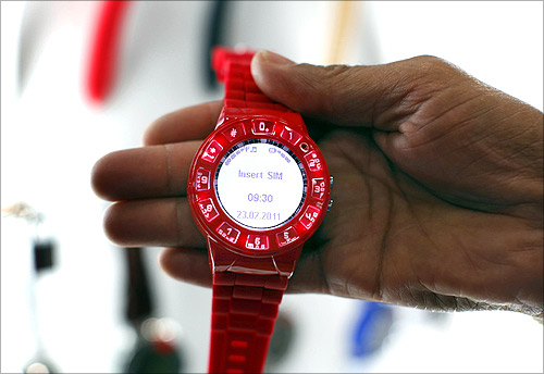 A watch phone by Burg is shown at the Cellular Telecommunications Industry Association event in San Diego.