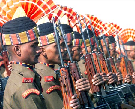 New recruits of the Border Security Force attend their attestation parade at a camp in Humhama, on the outskirts of Srinagar.