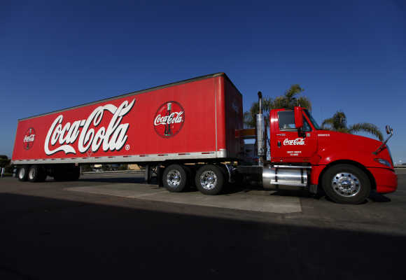 A Coca-Cola truck fills up with diesel fuel at a gas station in Carlsbad, California.