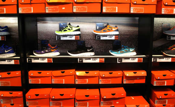 Nike running shoes are shown on display and for sale at a store in Encinitas, California.
