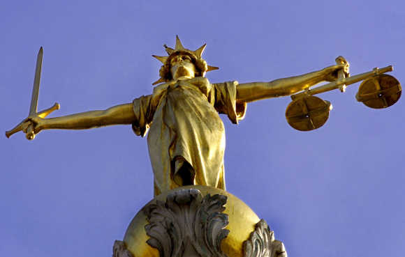 A statue of the Roman Goddess Justicia stands on top of the old Bailey in Cental London.