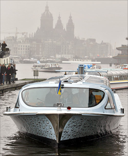 Nemo, the world's first canal boat powered by hydrogen fuel cell, arrives in Amsterdam.