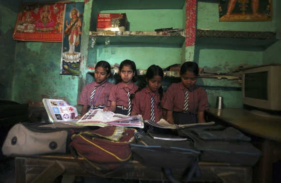 School girls inside their classroom at a primary school at Bhangel village in Uttar Pradesh.