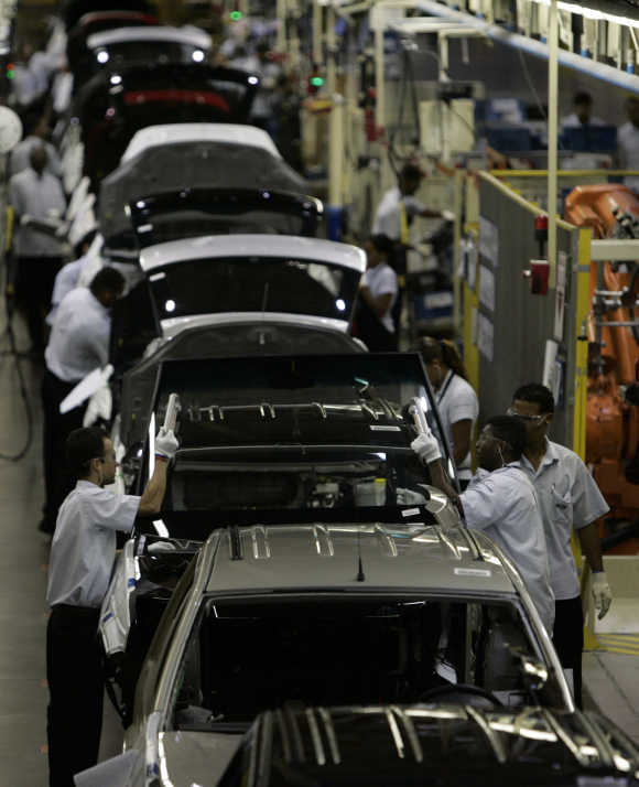 Workers at a plant in Camacari in Brazilian state of Bahia.
