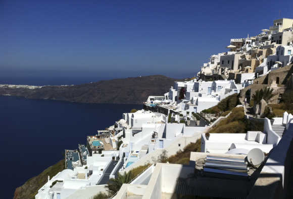 Houses are seen at edge of the caldera at the volcanic island of Santorini.