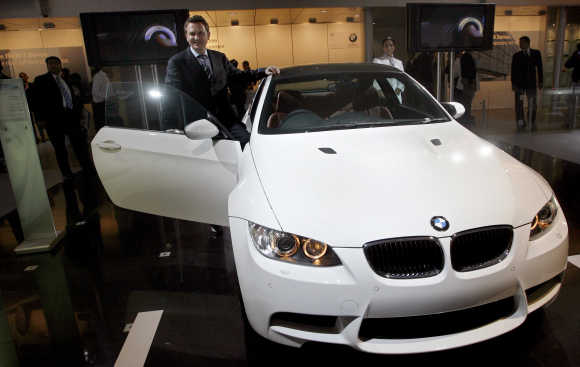 Peter Kronschnabl, President, BMW India, with M3 Coupe in New Delhi.