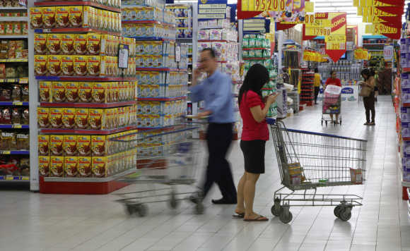 People shop at a Hypermart store in Jakarta.