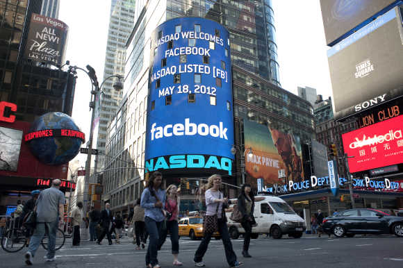 A monitor shows a welcoming message for Facebook's listing on the Nasdaq Marketsite prior to the opening bell in New York.
