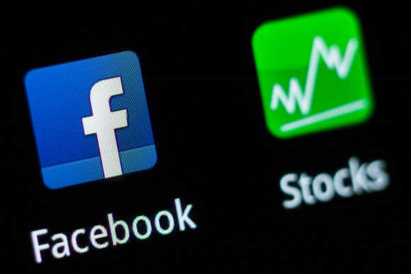 A Facebook application logo is pictured on a mobile phone in this photo illustration taken in Lavigny, Switzerland.
