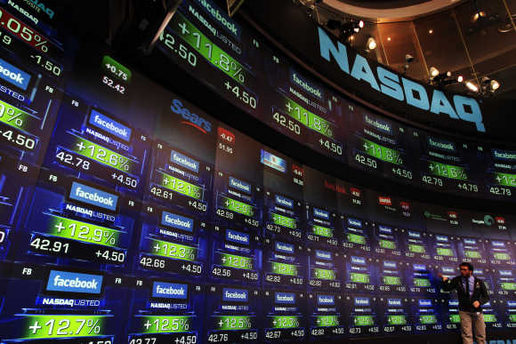 Facebook's share prices are seen inside the Nasdaq Marketsite in New York.