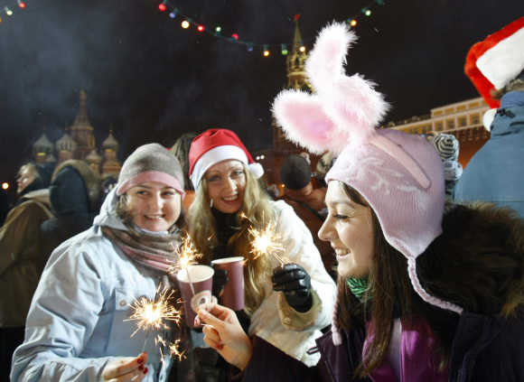 People celebrate New Year's Day on an ice rink in Red Square in Moscow.