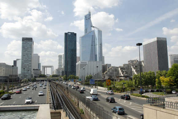 The 'First Tower', France's tallest skyscraper which measures 231 metres, is seen in the business district of La Defense, near Paris.