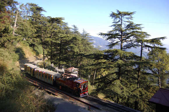 A 103-year-old steam engine runs on the 105-year-old Shimla-Kalka railway track in Shimla.