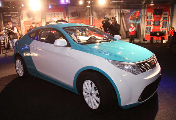 Cross-coupe automobile, produced and designed by Russian billionaire Mikhail Prokhorov