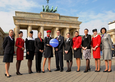 Uniformed representatives from all oneworld member airlines gather in front of Berlin's iconic Brandenburg Gate.