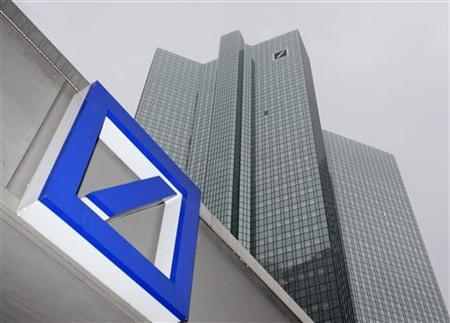 A Deutsche Bank logo is pictured in front of the Deutsche Bank headquarters in Frankfurt.