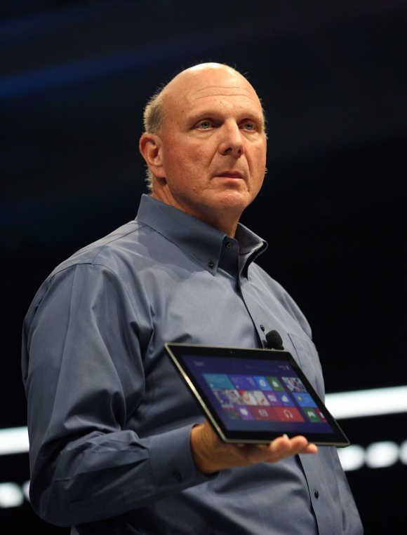 Microsoft CEO Steve Ballmer holds the Surface tablet in Los Angeles, California.