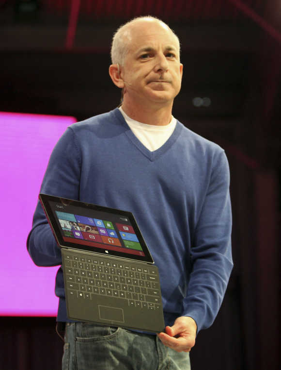 President of the the Windows and Windows Live Division, Steven Sinofsky, holds the Surface tablet computer during his presentation as it is unveiled in Los Angeles, California.