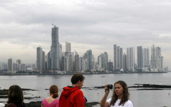 Tourist take pictures of Panama City.