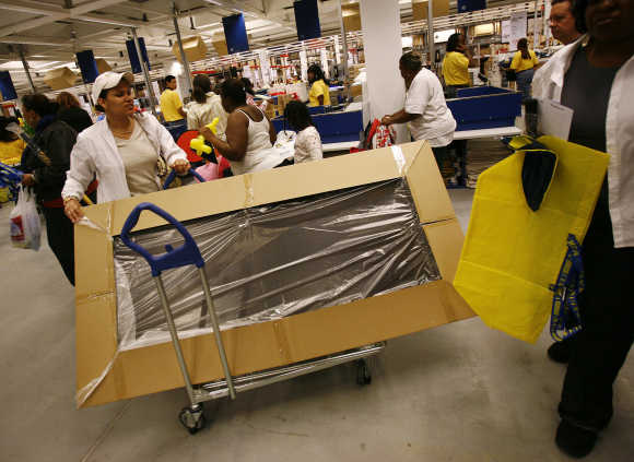 People shop at the Ikea home furnishing store in Brooklyn, New York.