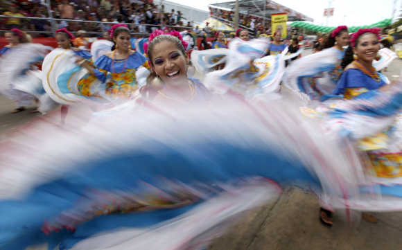 Dancers of Cumbia perform during a parade at the Barranquilla's carnival in Colombia.