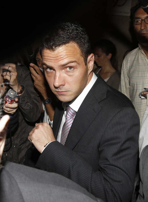 Former trader Kerviel arrives at Paris court for the start of his trial to face charges of breach of trust, computer abuse and forgery.
