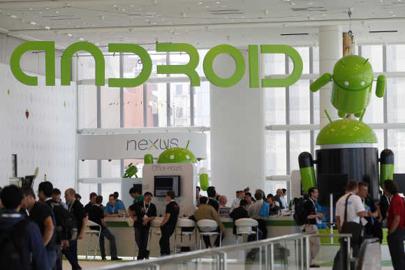 Attendees gather at the Android developer sandbox during the Google I/O Conference in San Francisco.